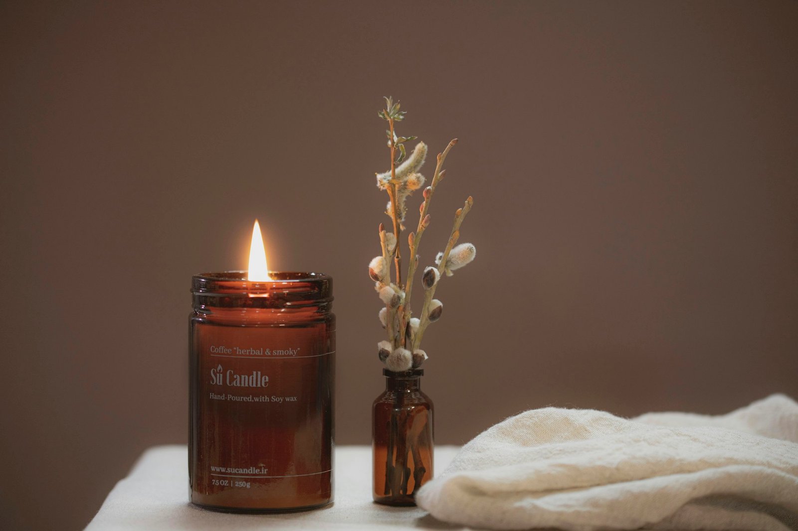 Candlelight and dried botanicals